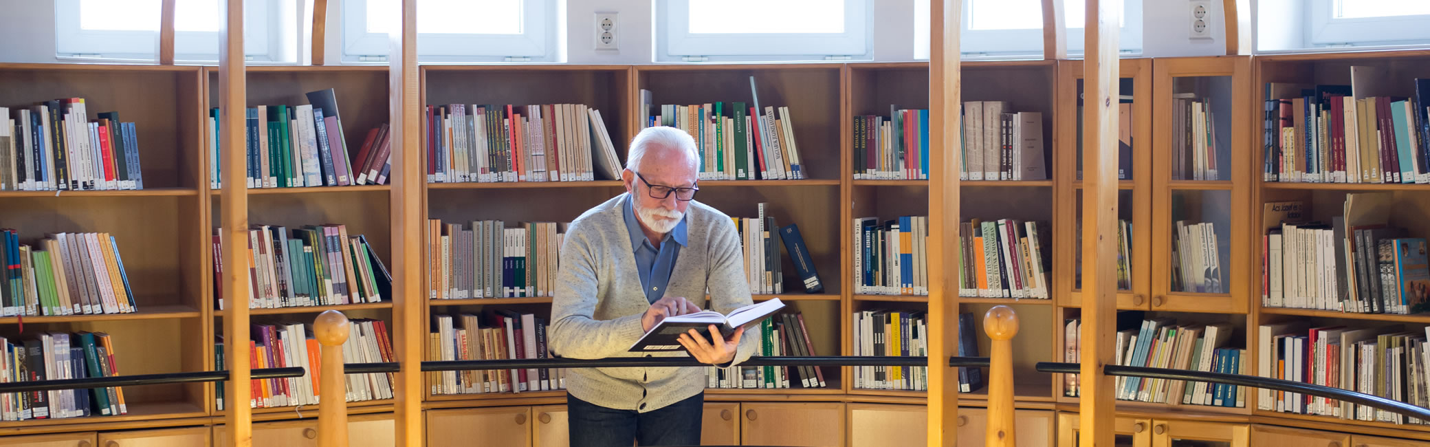 Man reading in library