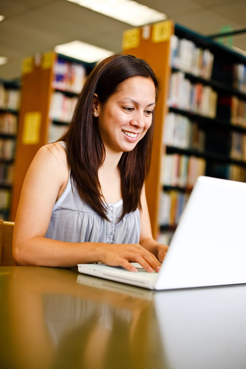 Woman reading in library