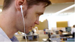 Person listening with headphones