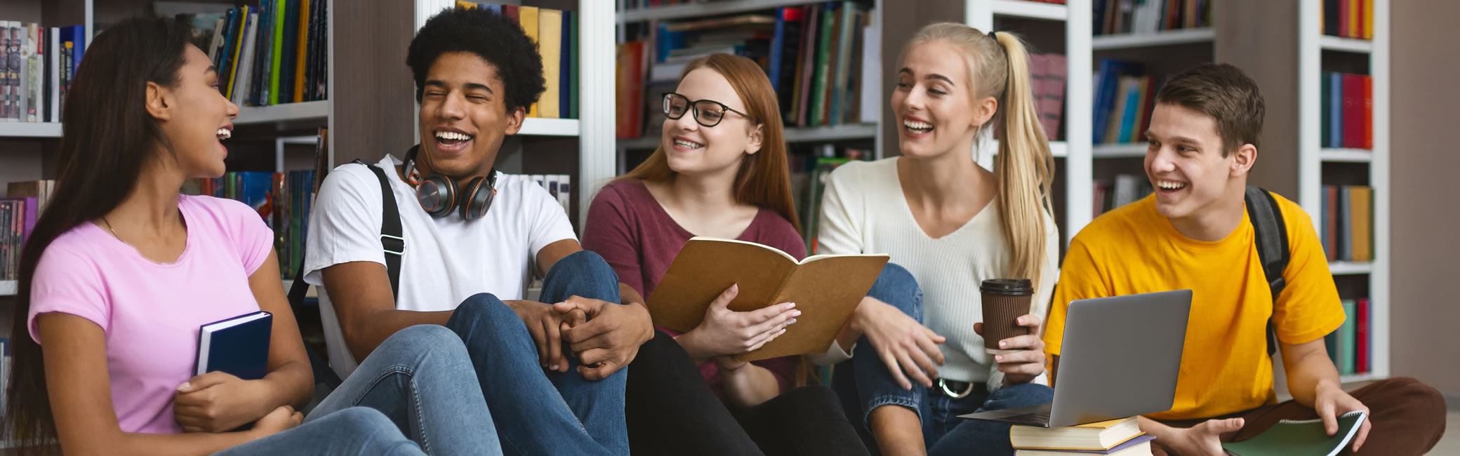 Group of young laughting in library